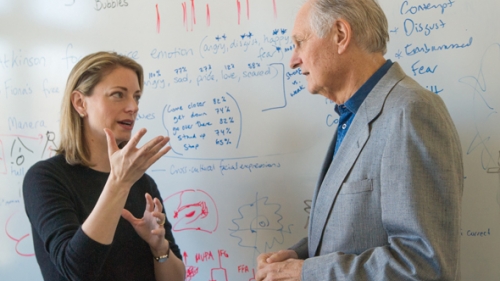 Professor Thalia Wheatley discusses her research with actor Alan Alda during his visit to campus in April 2012. (Photo by Eli Burakian ’00)